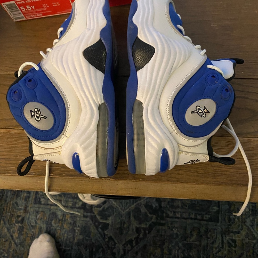 Nike Black and Blue Sneakers
Nike air pennies